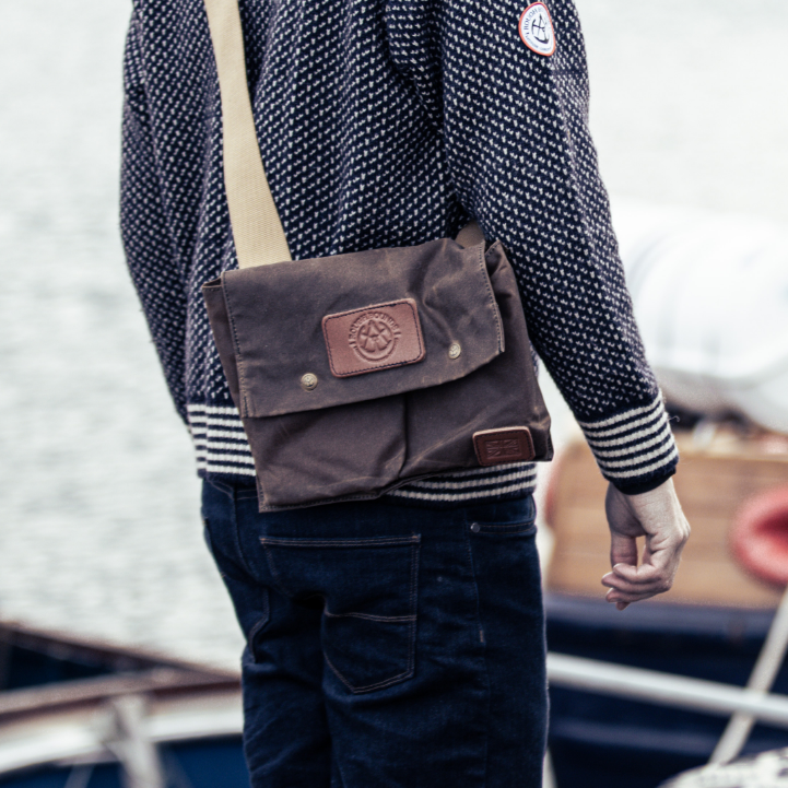 Rear view of man in Gunnerside Sweater wearing Pioneer Bag