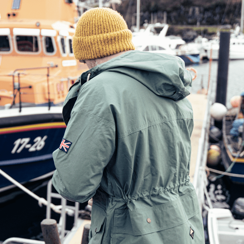 Rear view of man wearing Shimi Smock neat Mallaig Lifeboat